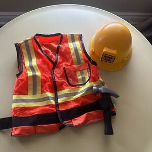 Kids play dress up construction worker costume with helmet